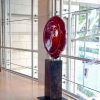 red sphere circle sculpture resn