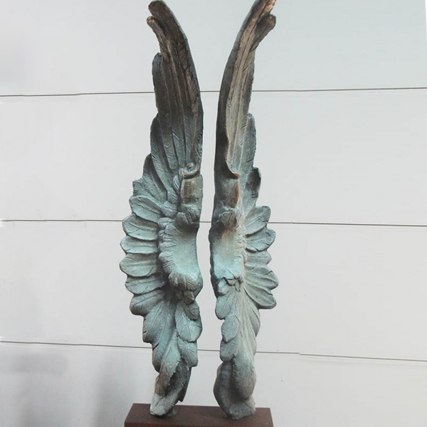 bronze wing sculpture