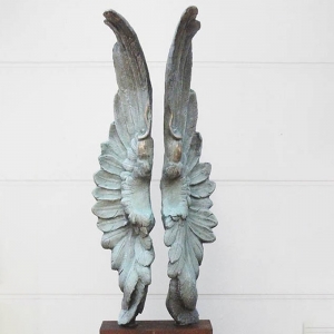 bronze wing sculpture