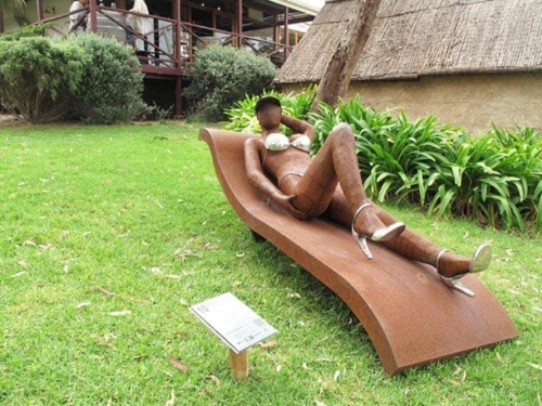 Corten & Stainless Steel Figurative Sculpture – Off the Face of It by Nicole Allen, 180x188x66cm | ARTpark Australia