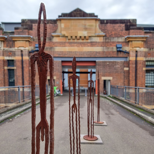 Corten Steel Figurative Sculpture – Observers by Greg Johns, 210cm | ARTpark Australia