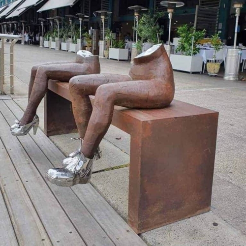 Corten & Stainless Steel Figurative Sculpture – Bums on Seats by Nicole Allen, 180x120x70cm | ARTpark Australia