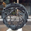 duel-axis_spherical-garden-sculpture-metal-garden-art-walsh-bay-sydney