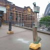 poets-scoundrels bronze totem sculpture in sydney
