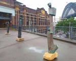 poets-scoundrels bronze totem sculpture in sydney