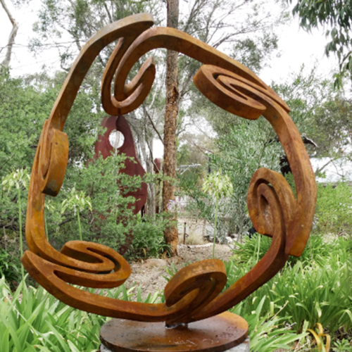 Corten Steel Round & Sphere Sculpture – Whirling Mandala by Greg Johns, 120x120cm | ARTpark Australia