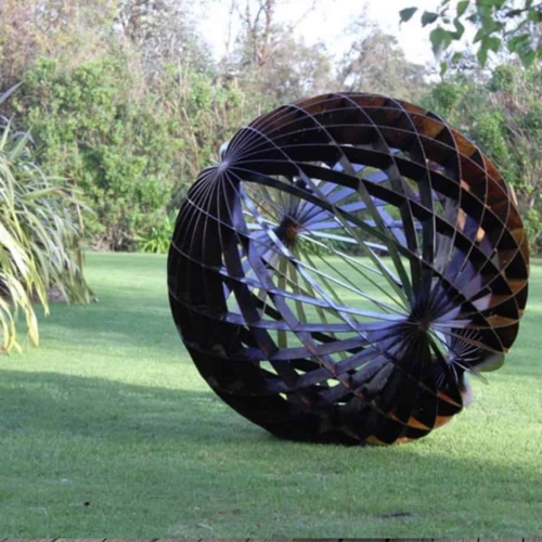 Corten Steel Round & Sphere Sculpture – Dual Axis by Paul Mutimer, 200cm Diameter | ARTpark Australia