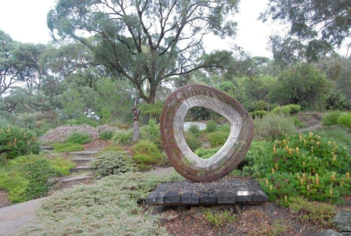 Corten Steel Garden Sculpture – Offset Orb by Paul Mutimer, 150x138x60cm | ARTpark Australia