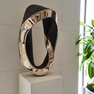 Mobius Curve - polished bronze interior sculpture