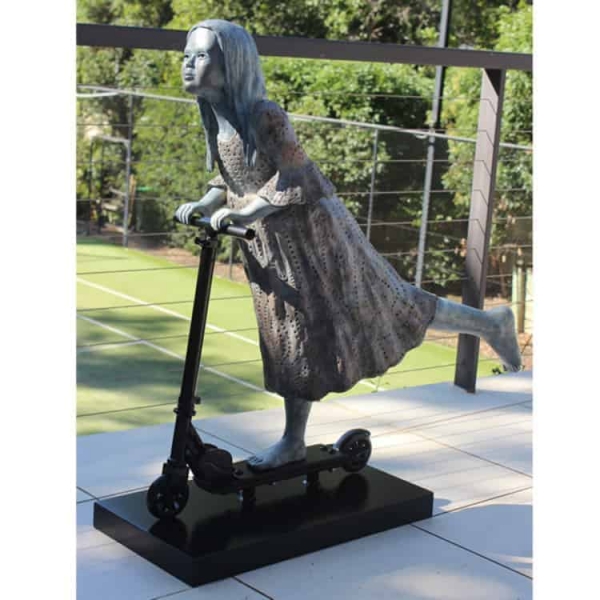 girl child bronze sculpture