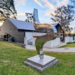 polished steel metal garden sculpture
