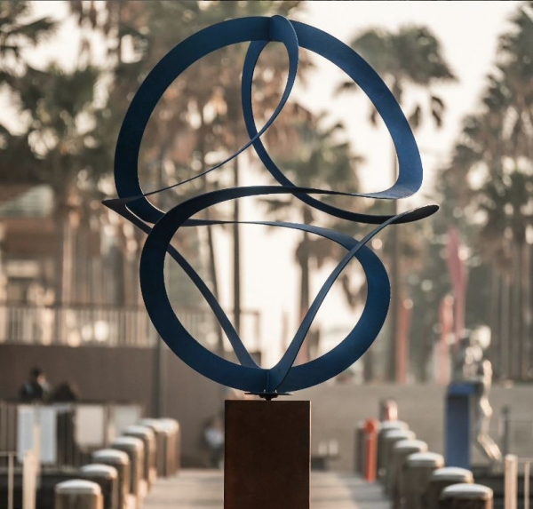 round garden sculpture kinetic