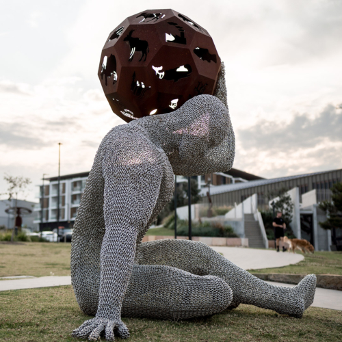 Stainless Steel Figurative Sculpture – Earth's Custodian by Michael Van Dam, 3.2m | ARTpark Australia