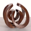 bronze round sculpture