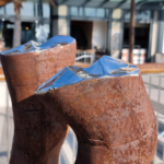 Corten & Stainless Steel Figurative Sculpture – These Boots Are Made for Walking by Nicole Allen, 66x30x40cm on 80x45x45cm Plinth | ARTpark Australia