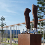 Corten & Stainless Steel Figurative Sculpture – These Boots Are Made for Walking by Nicole Allen, 66x30x40cm on 80x45x45cm Plinth | ARTpark Australia