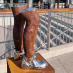 Corten & Stainless Steel Figurative Sculpture – These Boots Are Made for Walking by Nicole Allen, 66x30x40cm on 80x45x45cm Plinth | ARTpark Australia