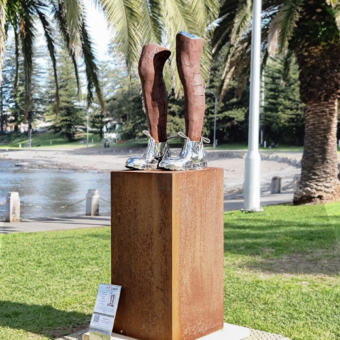 Corten & Stainless Steel Figurative Sculpture – These Boots Are Made for Walking by Nicole Allen, 66x30x40cm on 80x45x45cm Plinth | ARTpark Australia