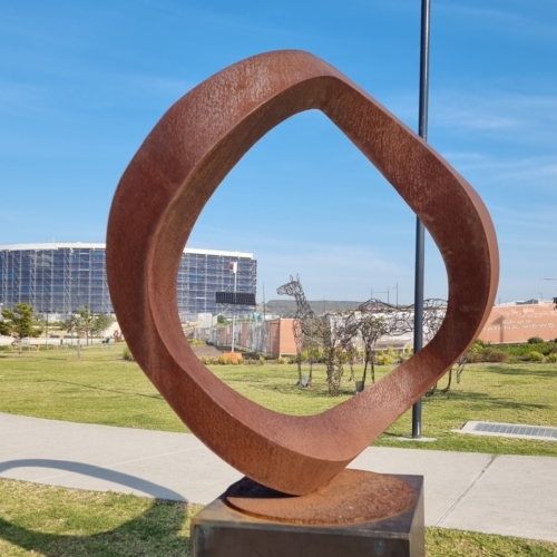 Corten Steel Landmark Sculpture – Wavering Circle by Greg Johns, 150cm Diameter | ARTpark Australia