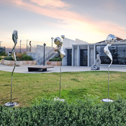 Stainless Steel & Corten Figurative Sculpture – Figures in the landscape by Hugh McLachlan, 200cm | ARTpark Australia