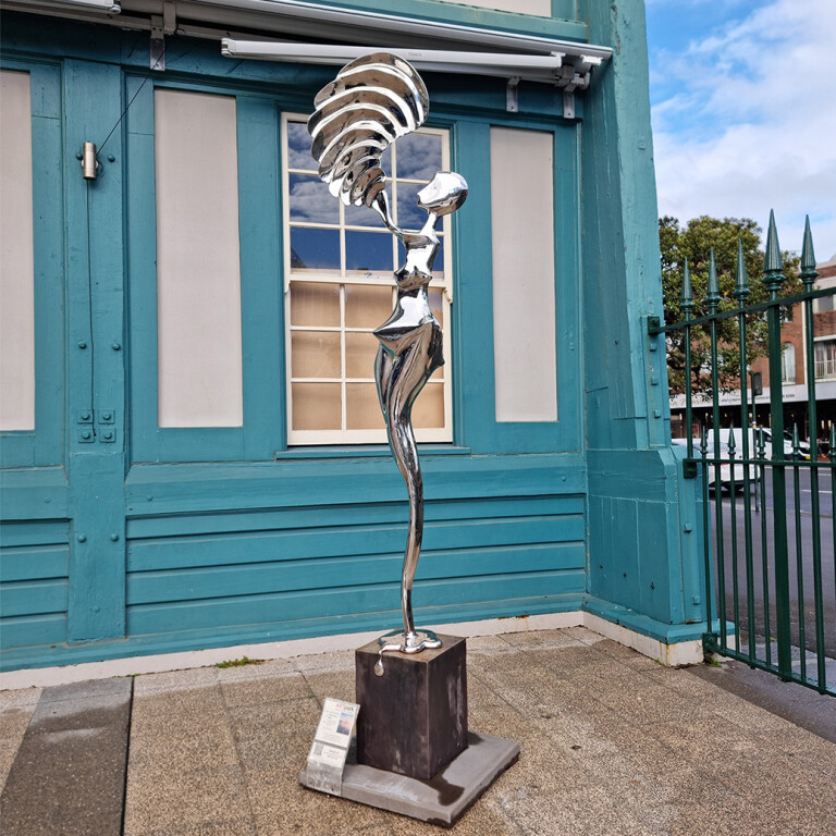 Stainless Steel Figurative Sculpture – Muse of Time by Hugh McLachlan, 260cm - view 7