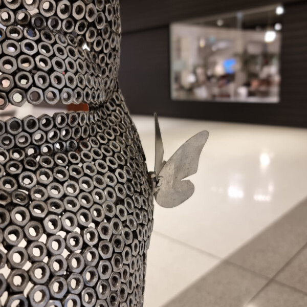 metal female sculpture