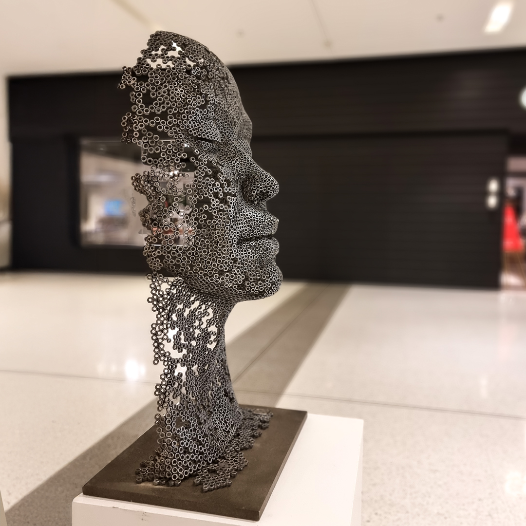 metal female sculpture