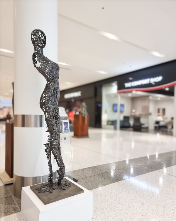 metal female sculpture