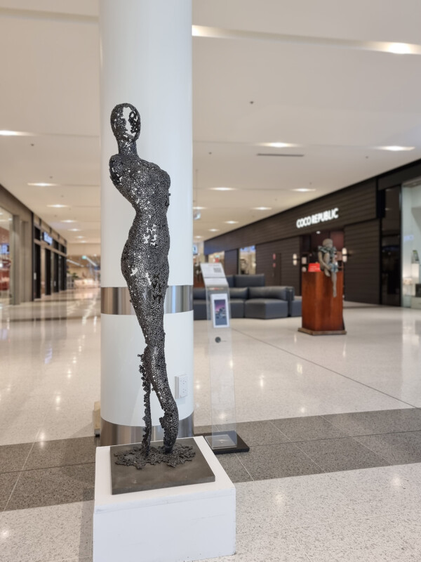 metal female sculpture