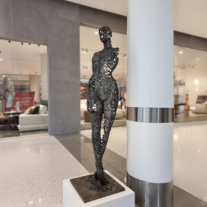 metal female sculpture