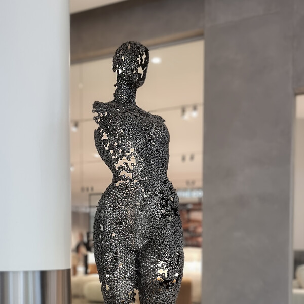 metal female sculpture