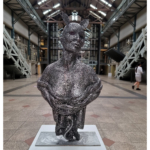 metal female sculpture