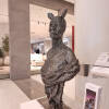 metal female sculpture