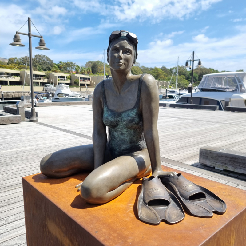 bronze swimming sculpture outdoor