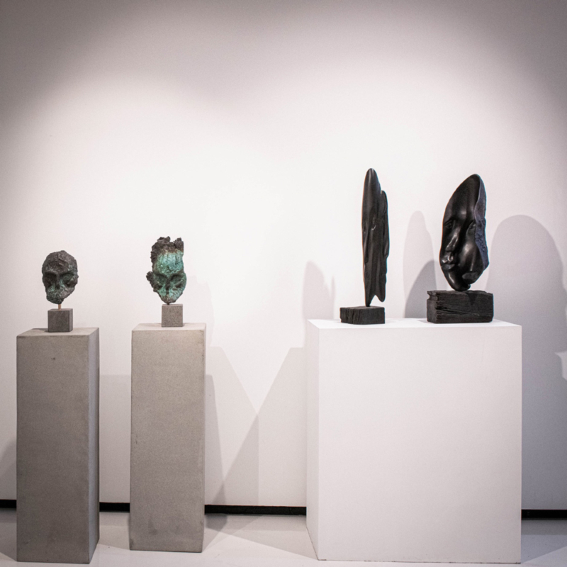 bronze interior sculpture, bookshelf sculpture,