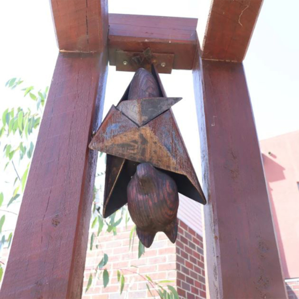 Timber Fruit Bat Sculpture – Carved Animals by Lucas Guilbert | ARTpark Australia