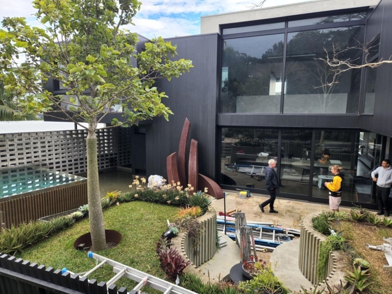 The Yearning by Linda Bowden, Corten steel, during installation in a private garden